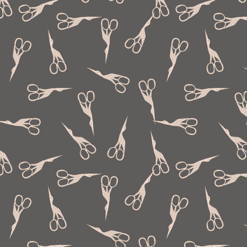 white vintage scissors in gray background